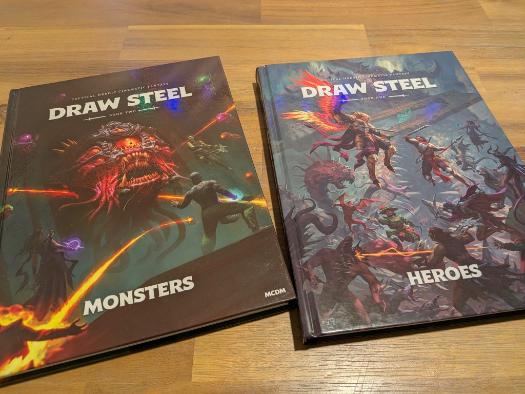 Covers of the DRAW STEEL hardcover books
